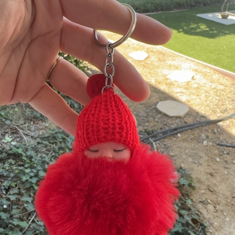 Fluffy doll with a key ring